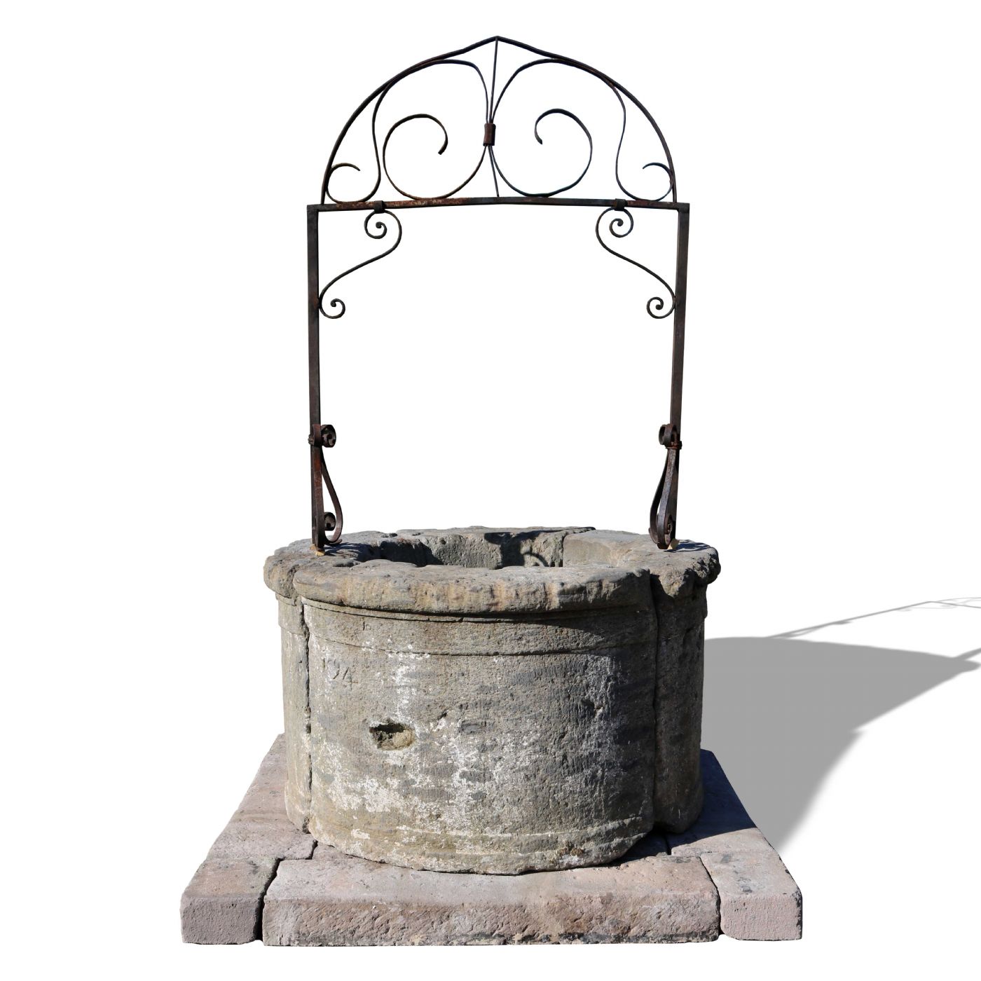 Ancient stone well. Dated 1594.